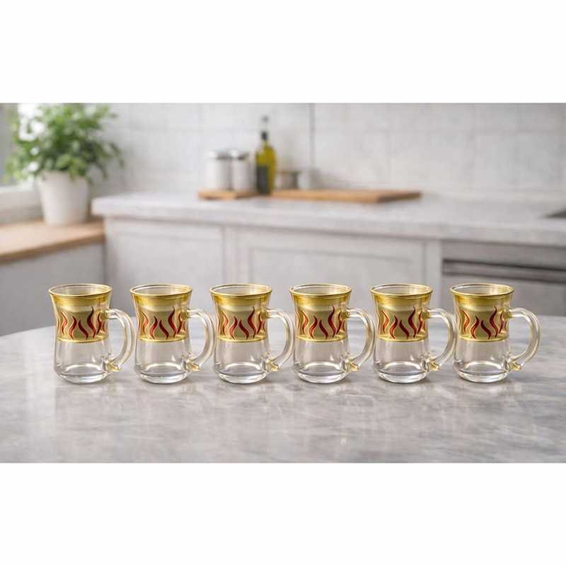 Gold-rimmed handle glass